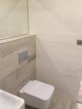 Koupelna se sprchovým koutem v novostavbě RD